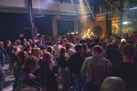 Large crowd at an indoor concert