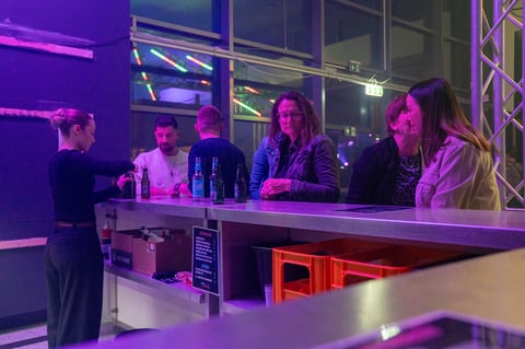 Bartenders at nightclub bar